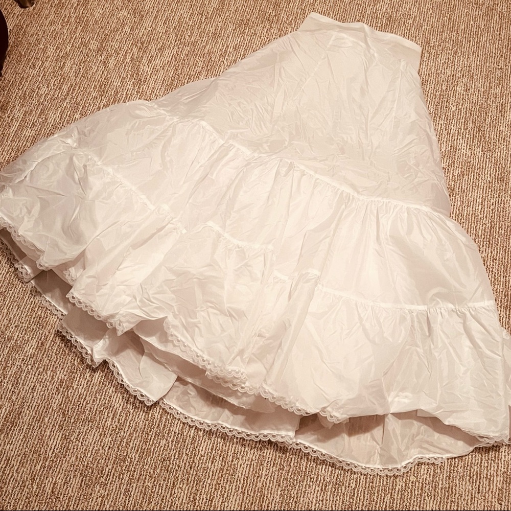 Ballgown slip David’s Bridal. Size 14. Great condition.